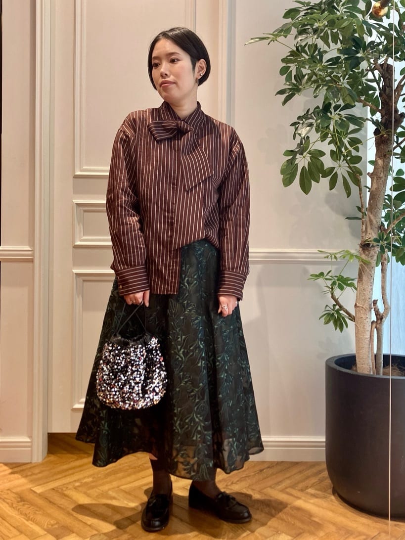 konominさんの「DRESSTERIOR｜スパンコール2WAY巾着バッグ」を使ったコーディネート