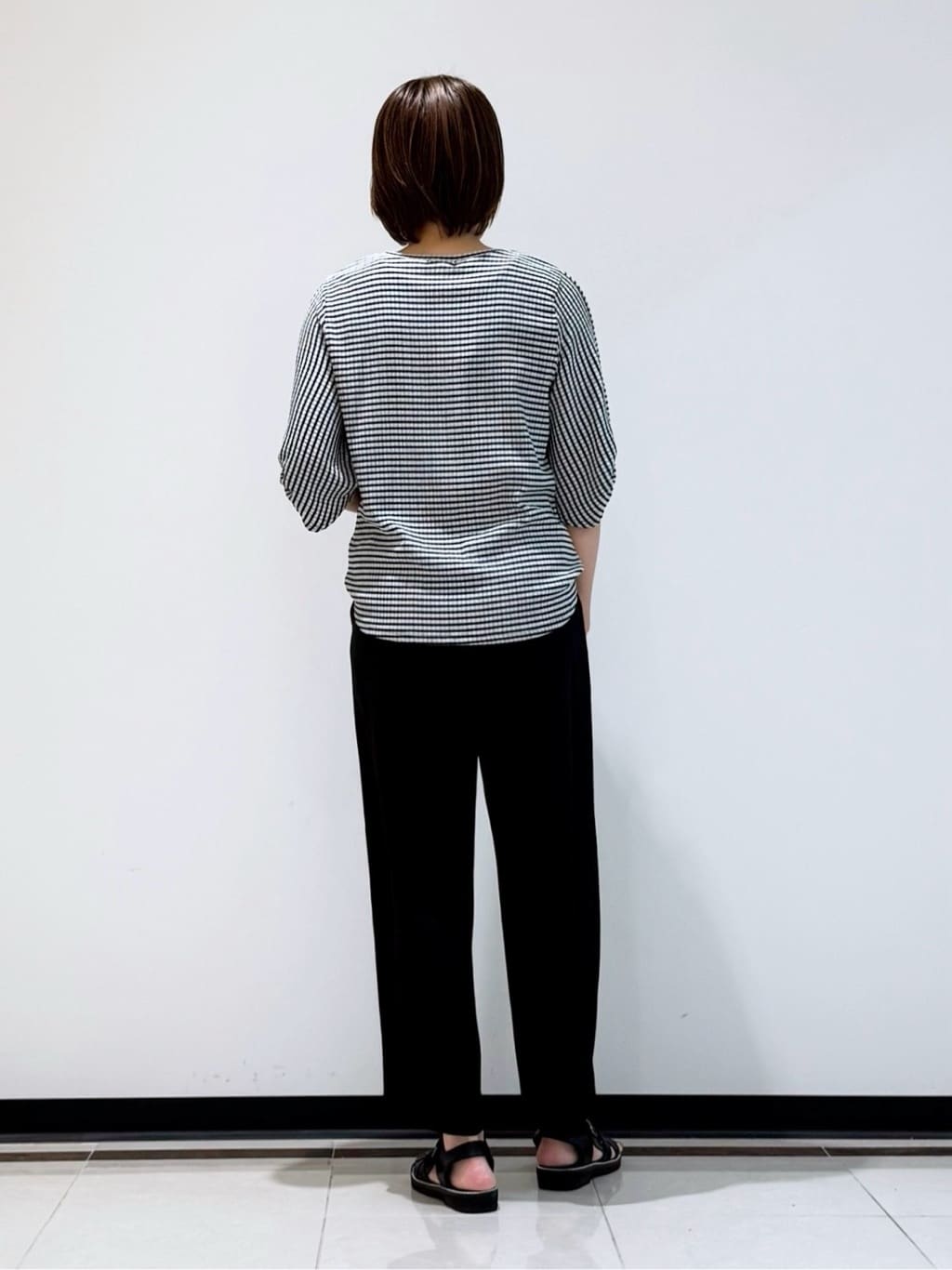 mikaさんの「INDIVI｜【UVケア／吸汗速乾】凹凸素材ねじり袖トップス」を使ったコーディネート