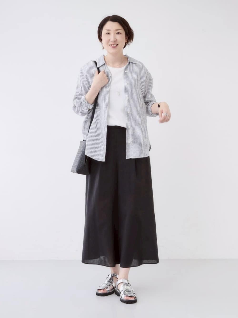 yuriさんの「INDIVI｜【2点セット／着回し◎】ノースリーブ＆ティアードスカート カセット服」を使ったコーディネート