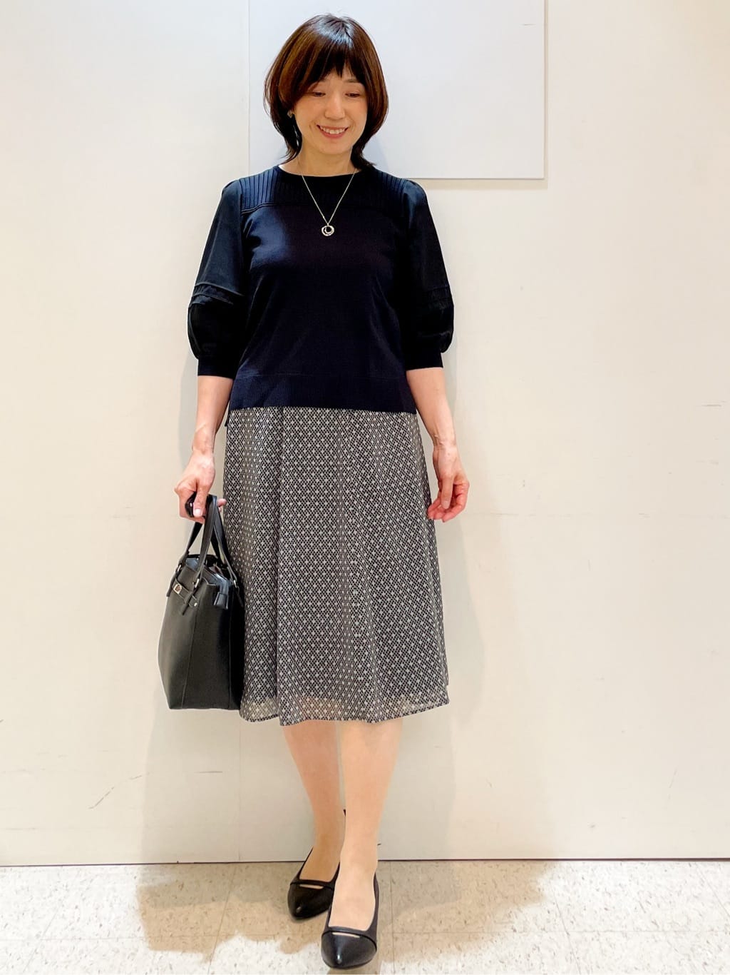 めいさんの「Reflect｜【マシンウォッシュ可／セットアップ可】コツキ柄プリントフレアスカート」を使ったコーディネート