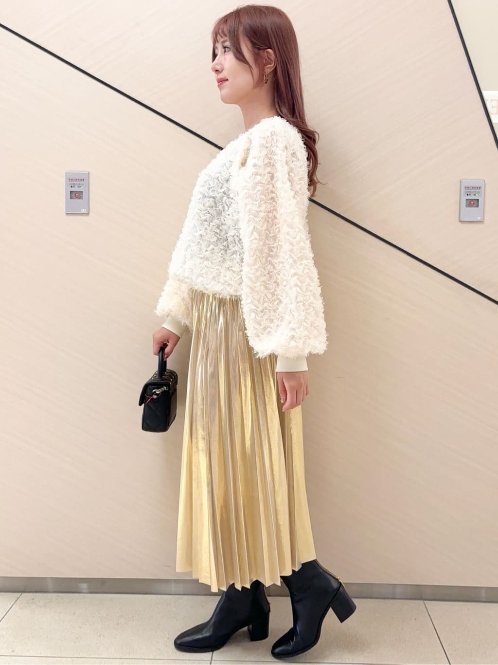 Rinaさんの「DRESSTERIOR｜◆【洗える/ストレッチ性/オンオフ】箔プリントプリーツスカート」を使ったコーディネート