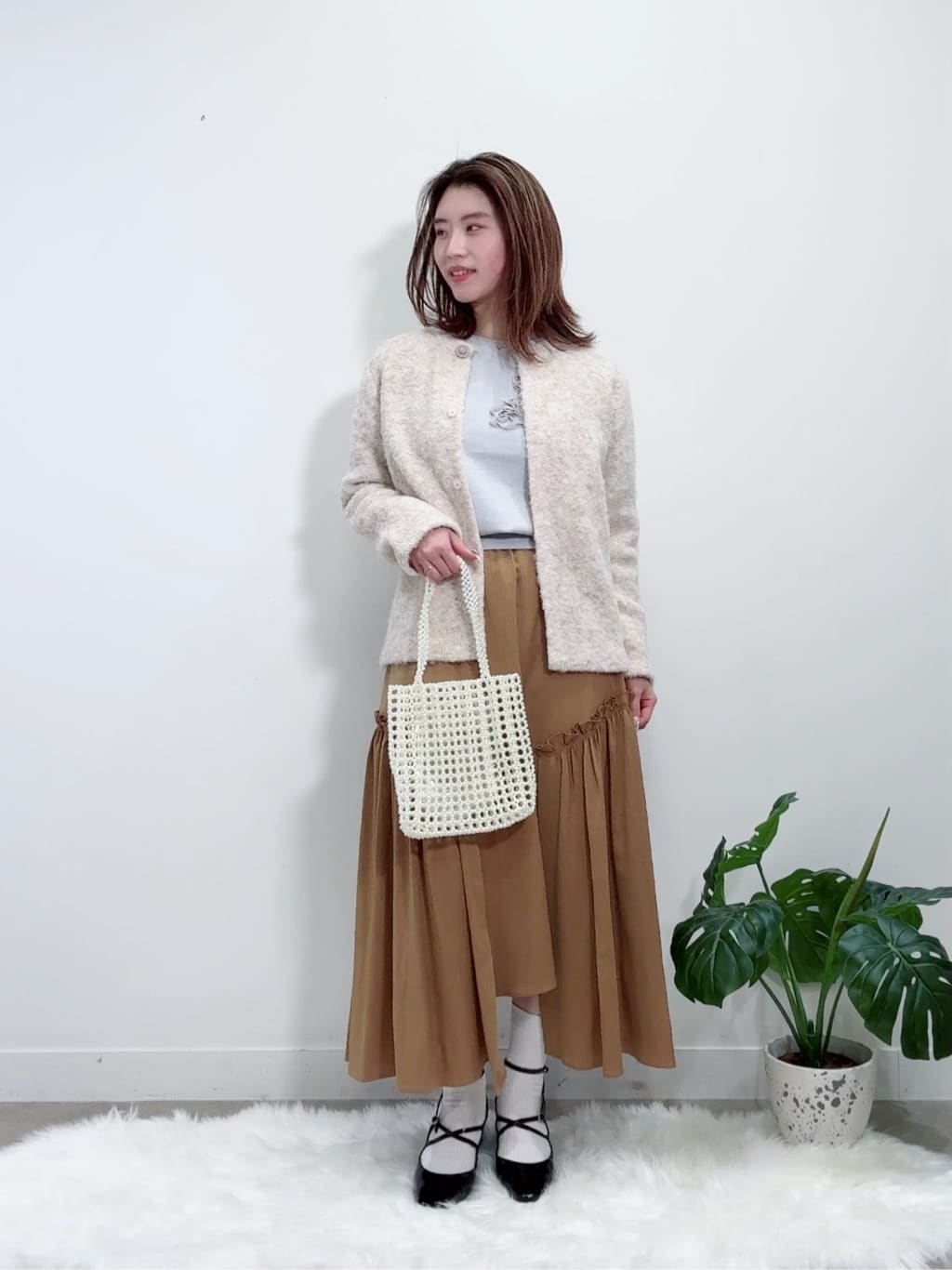 Suma Una本部スタッフさんの「SunaUna｜【ループヤーン／ふんわり】ミドル丈カーディガン」を使ったコーディネート