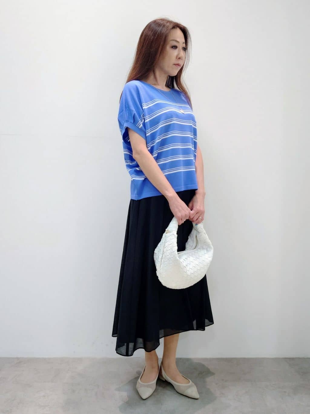 yoshiさんの「Reflect｜【マシンウォッシュ可／セットアップ可】シアーボックスタックプリーツスカート」を使ったコーディネート