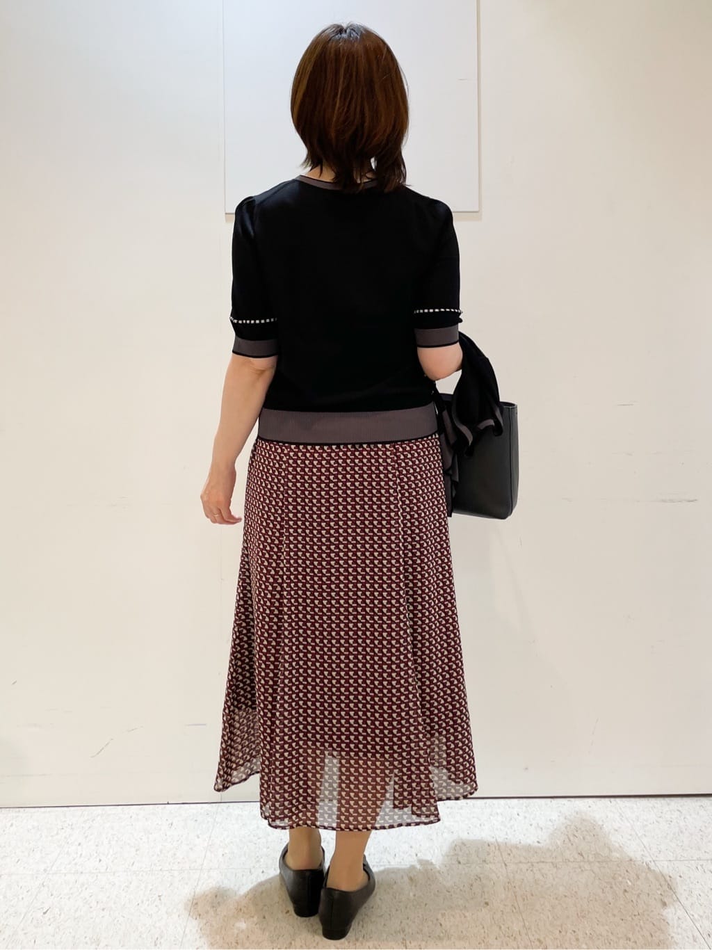 めいさんの「Reflect｜【WEB先行カラーあり／マシンウォッシュ可／ウエスト総ゴム】コツキ幾何柄ロングスカート」を使ったコーディネート