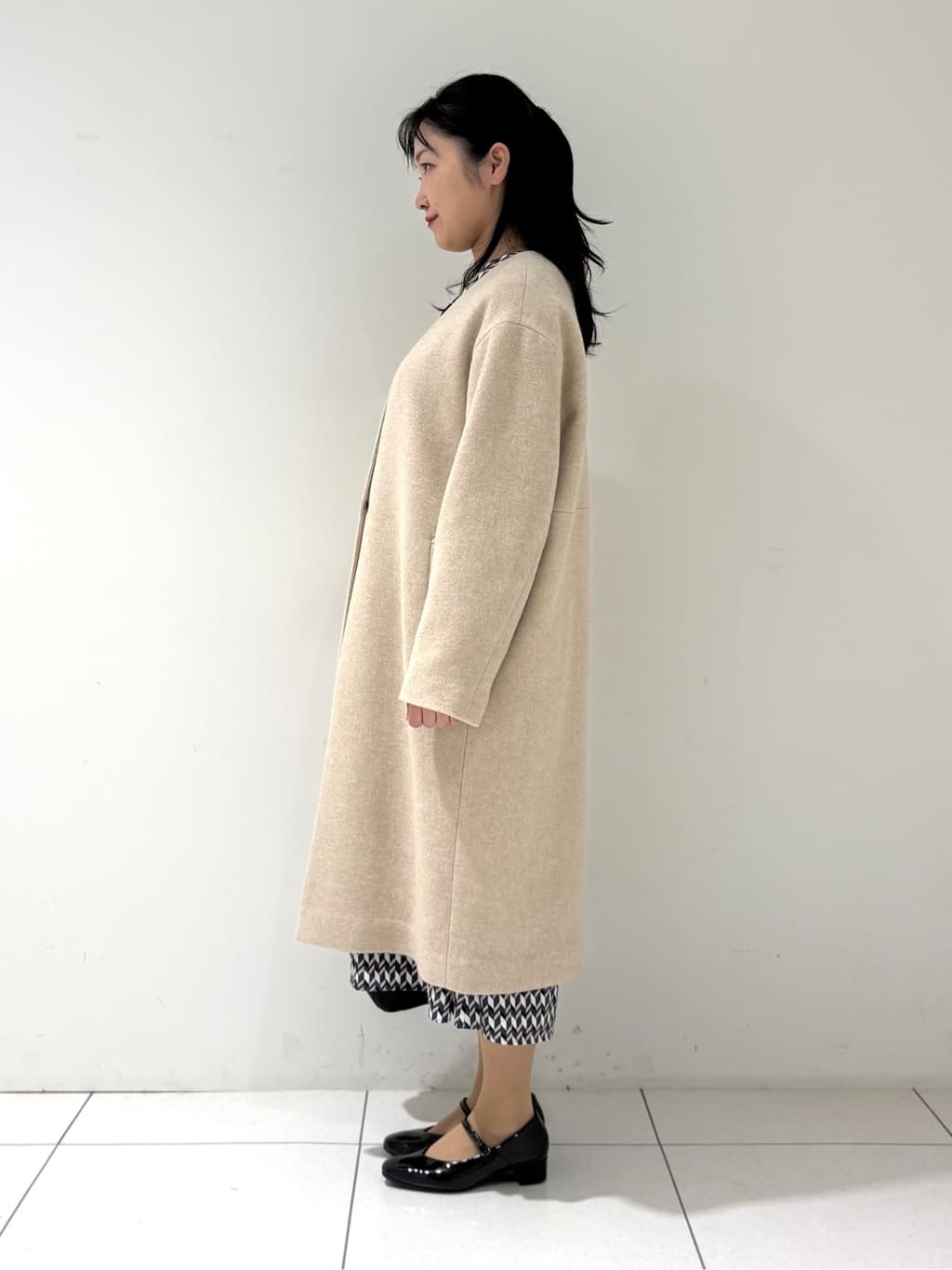 momokoさんの「INDIVI｜【軽量／ウール混】ライトフォルム ロングコート」を使ったコーディネート