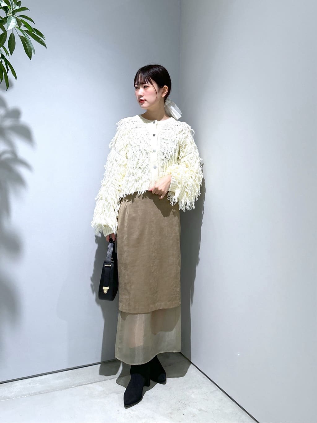Renoさんの「INDIVI｜クロップドループカーディガン」を使ったコーディネート