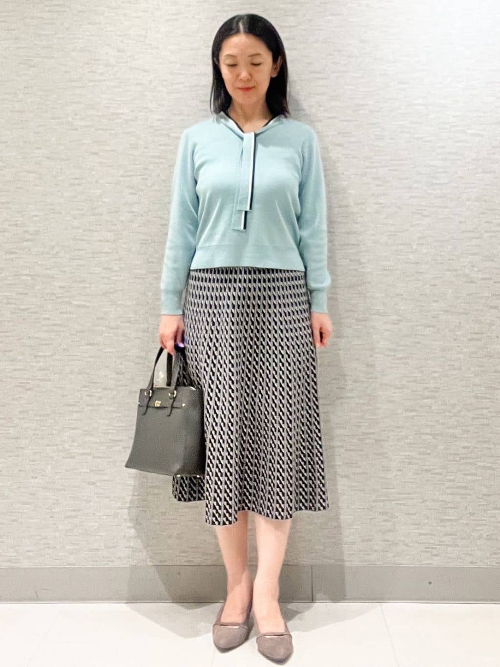 marikoさんの「Reflect｜【WEB先行カラーあり／セットアップ可】幾何調柄ニットスカート」を使ったコーディネート