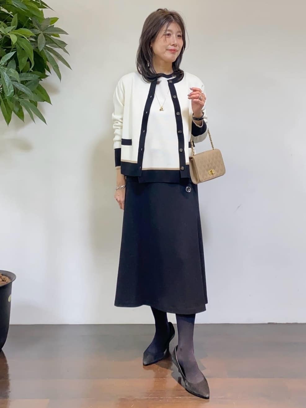tomoさんの「UNTITLED｜【トレンド／ギフト】ファー＆ポーチチャーム」を使ったコーディネート