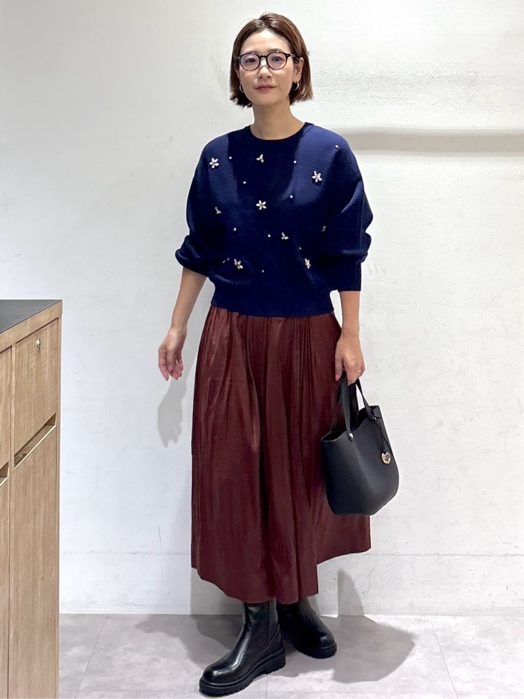 たけねぇさんの「OPAQUE.CLIP｜レザーライクタックフレアスカート【洗濯機洗い可】」を使ったコーディネート