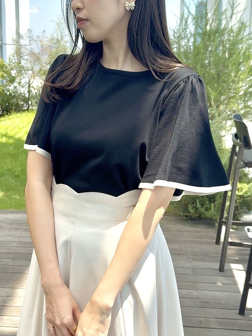 teiさんの「Couture brooch｜【フェミニン・5分袖・通勤】配色フレアスリーブニット」を使ったコーディネート