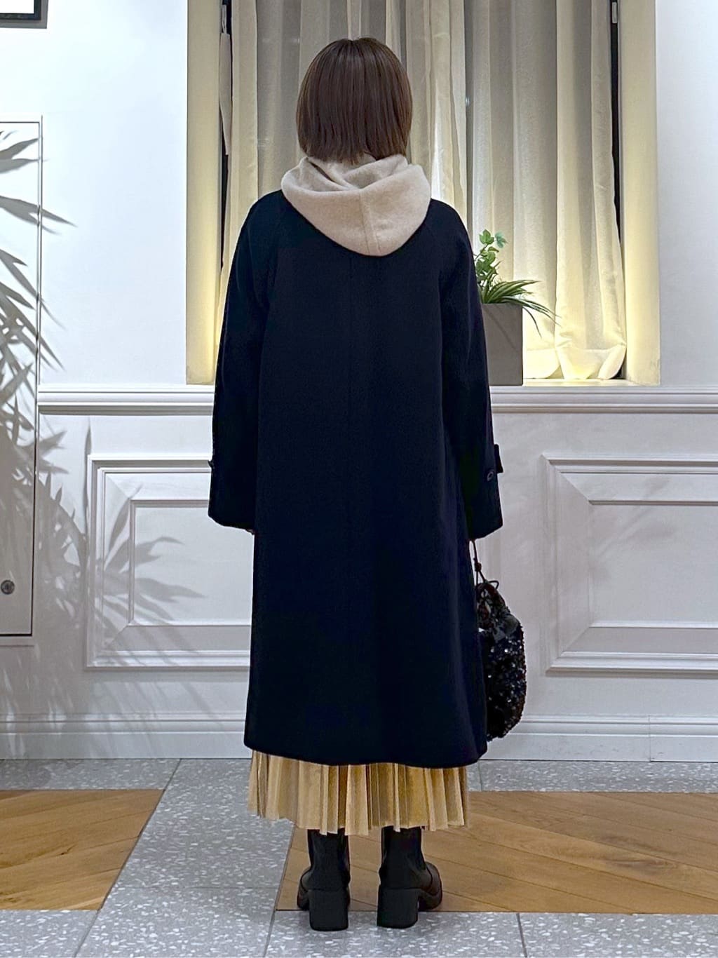 なべこさんの「DRESSTERIOR｜◆【洗える/ストレッチ性/オンオフ】箔プリントプリーツスカート」を使ったコーディネート