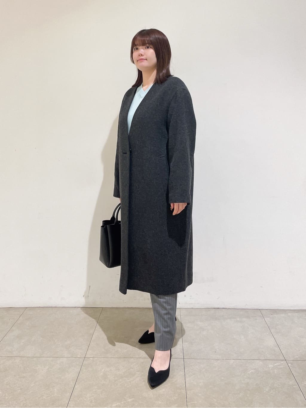 emikaさんの「INDIVI｜【軽量／ウール混】ライトフォルム ロングコート」を使ったコーディネート