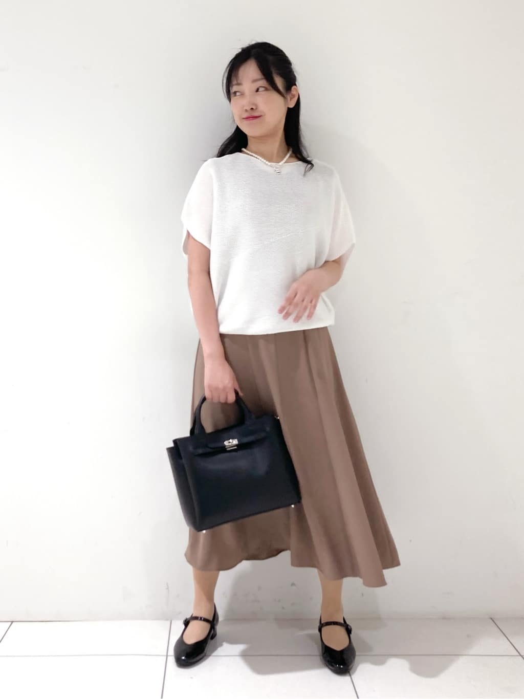 momokoさんの「INDIVI｜【洗える／清涼感】コクーンシルエットニット」を使ったコーディネート