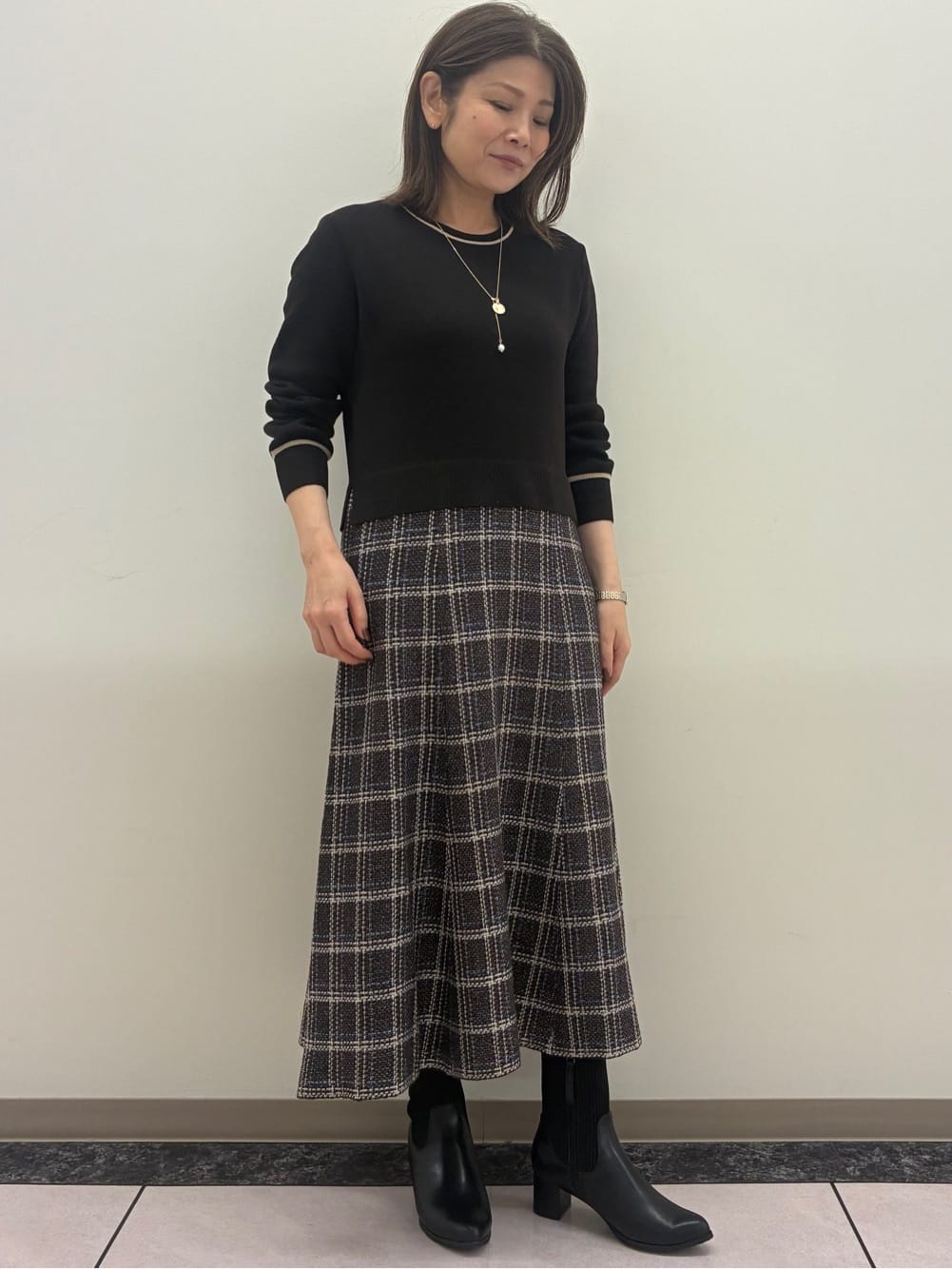 ちいさんの「Reflect｜【コートインでもすっきり◎】チェック柄ニットドッキングワンピース」を使ったコーディネート