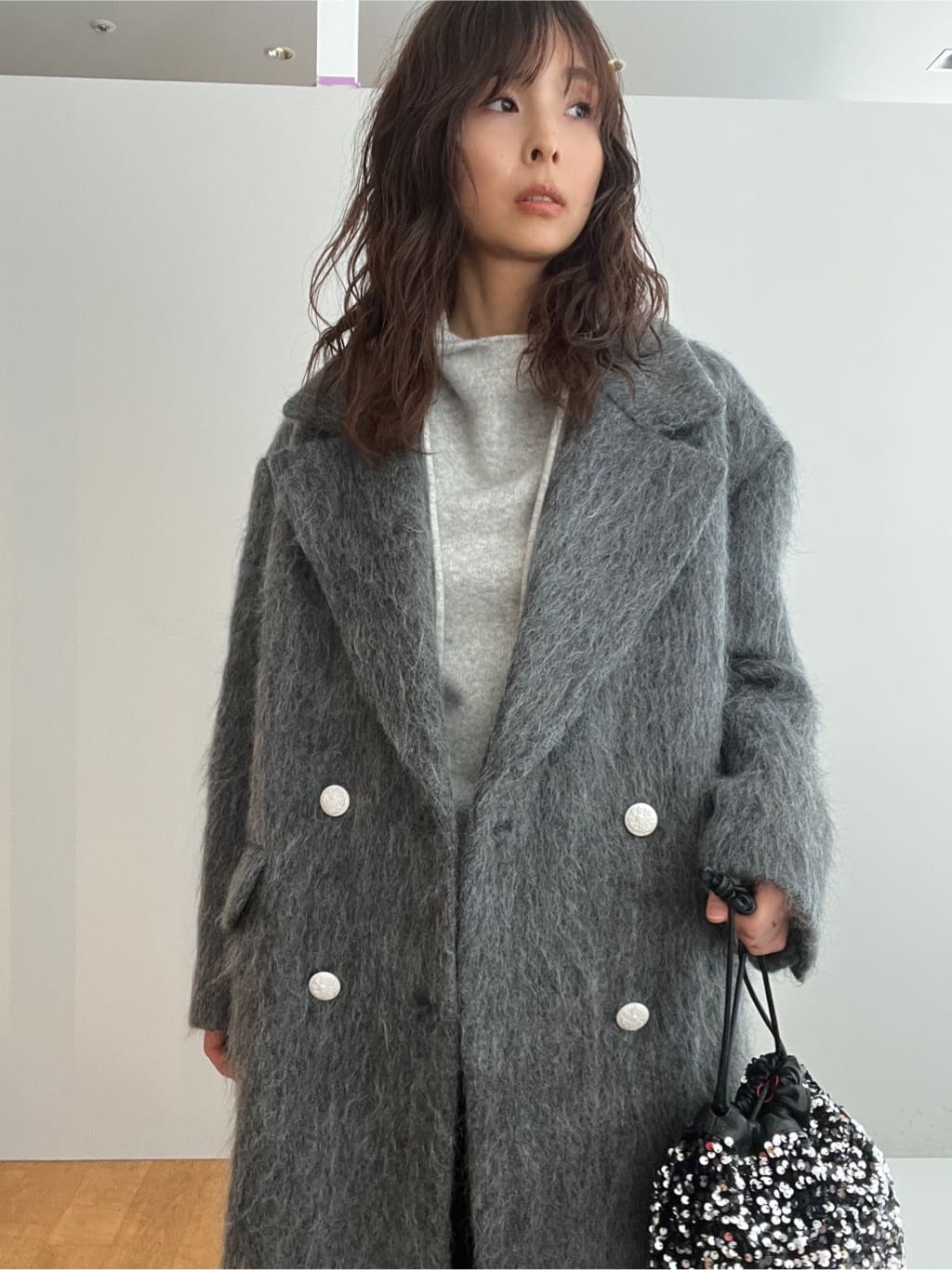 misaさんの「DRESSTERIOR｜スパンコール2WAY巾着バッグ」を使ったコーディネート