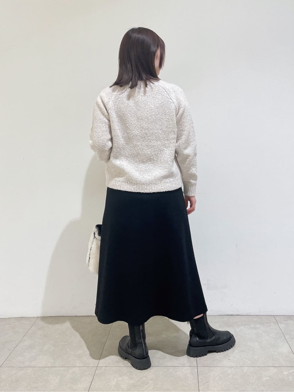emikaさんの「INDIVI｜【洗える／ラメ／意匠感】ミックスブークレニット」を使ったコーディネート