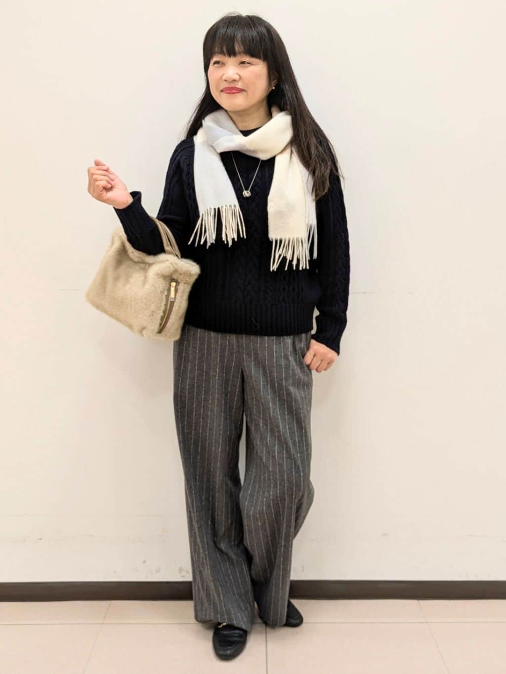 ともさんの「UNTITLED｜【洗える】スポンディッシュ ケーブル柄ニット」を使ったコーディネート