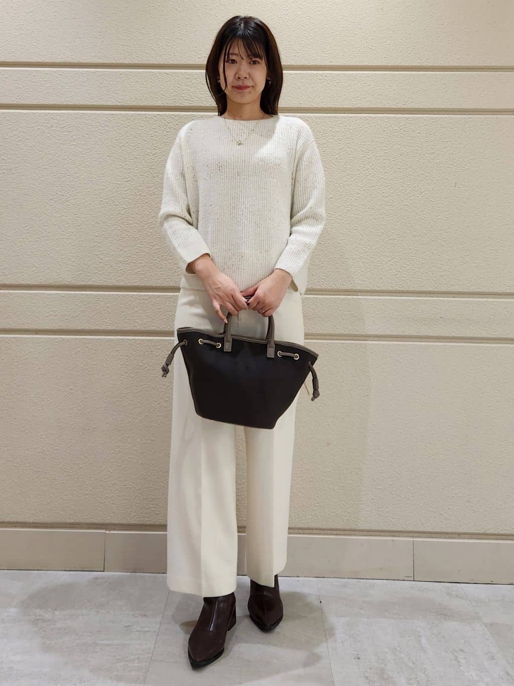 yukaさんの「COUP DE CHANCE｜◆【手洗い可】スパンコール付ニットトップス」を使ったコーディネート