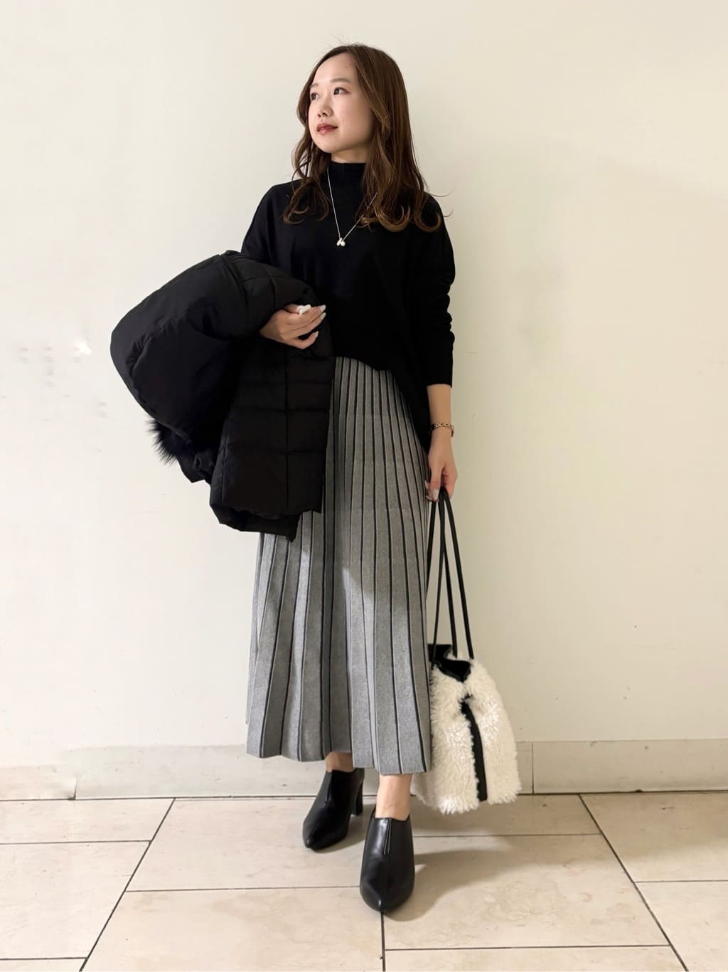 kahoさんの「INDIVI｜【洗える／毛玉になりにくい】エクストラファインウール ハイネックニット」を使ったコーディネート