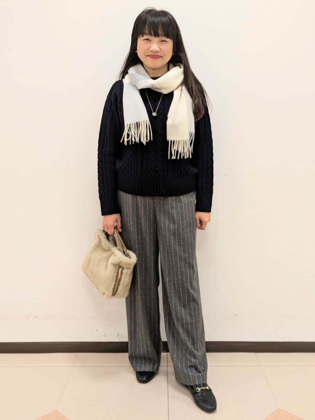 ともさんの「UNTITLED｜【洗える】スポンディッシュ ケーブル柄ニット」を使ったコーディネート