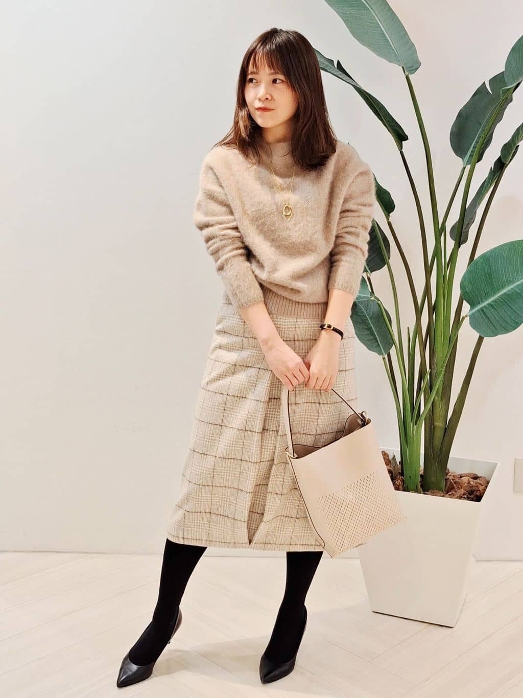 YuKaRiさんの「UNTITLED｜【ふんわり/タイト見え】グレンチェックスカート」を使ったコーディネート