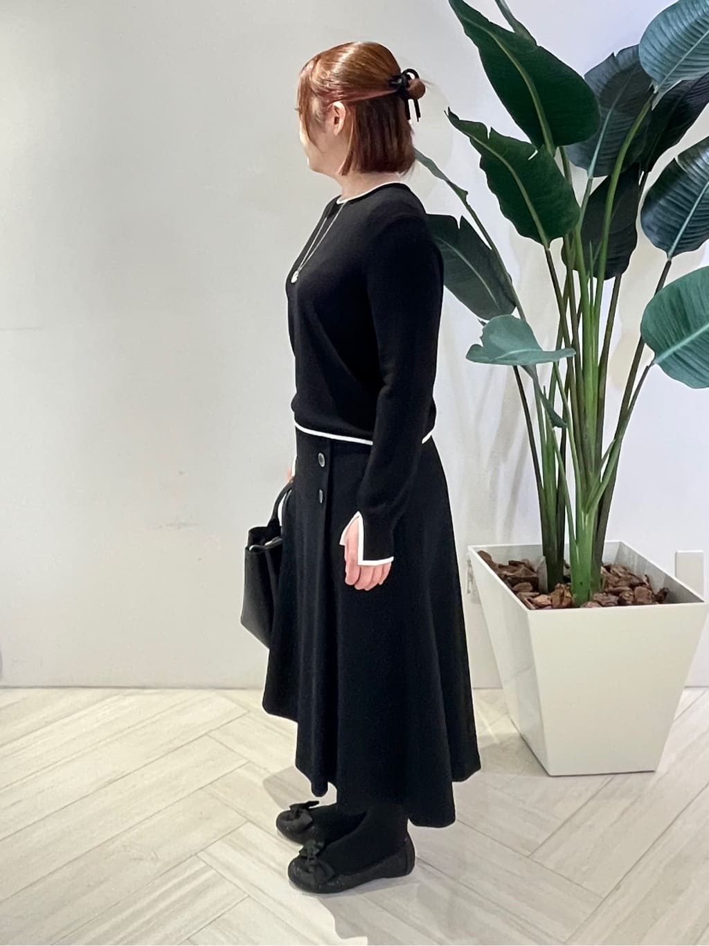 Tomoさんの「UNTITLED｜【はっ水機能/フード取り外し可】ミディダウンコート」を使ったコーディネート