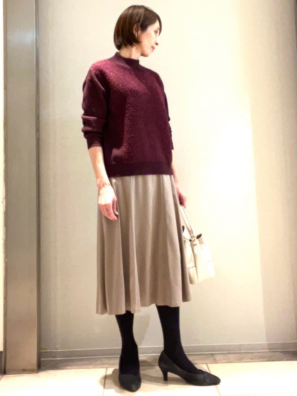 TOMOMIさんの「Reflect｜アーガイル柄ハイネックニット」を使ったコーディネート