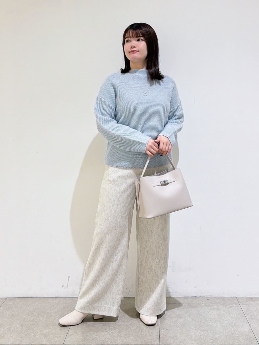 emikaさんの「INDIVI｜【洗える／大人ラメ】カラーMIXボトルネックニット」を使ったコーディネート