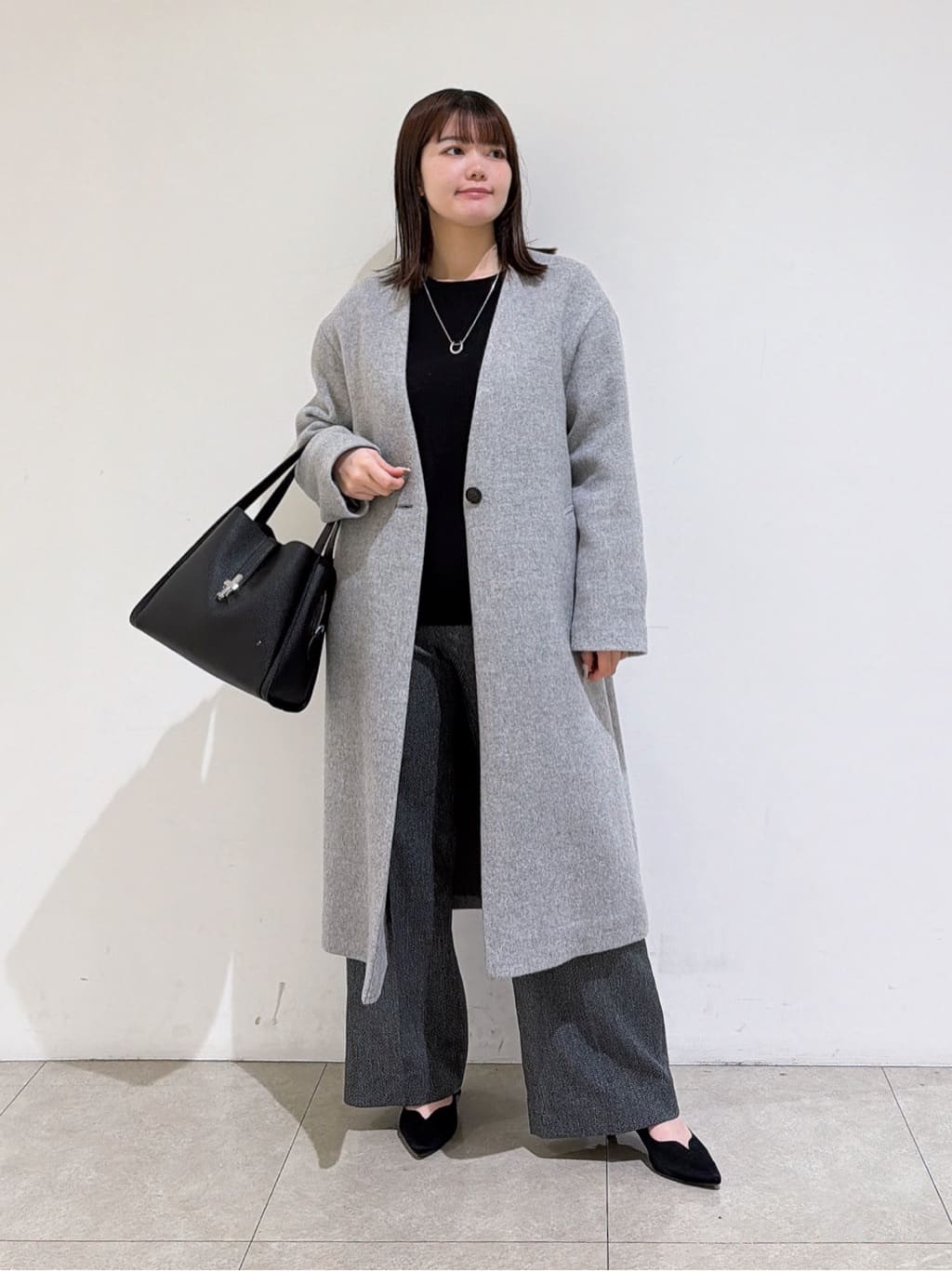 emikaさんの「INDIVI｜【軽量／ウール混】ライトフォルム ロングコート」を使ったコーディネート