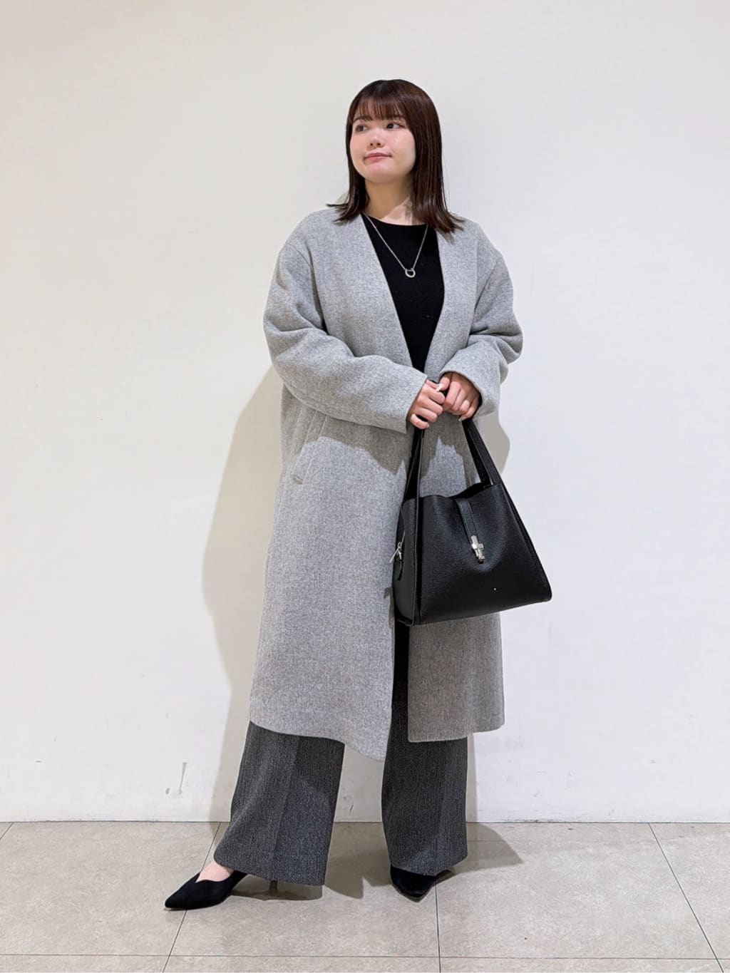 emikaさんの「INDIVI｜【軽量／ウール混】ライトフォルム ロングコート」を使ったコーディネート