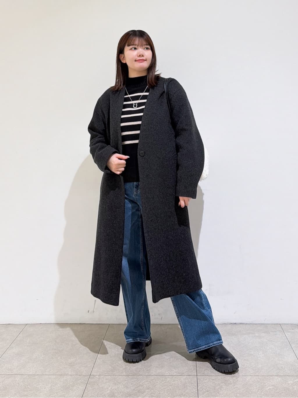 emikaさんの「INDIVI｜【軽量／ウール混】ライトフォルム ロングコート」を使ったコーディネート