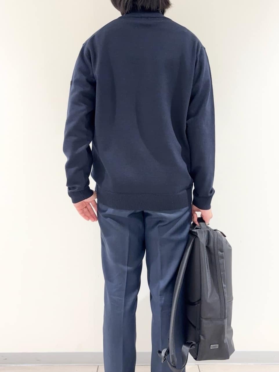 及川さんの「TAKEO KIKUCHI｜アンチピリング ジップアップ ニット」を使ったコーディネート