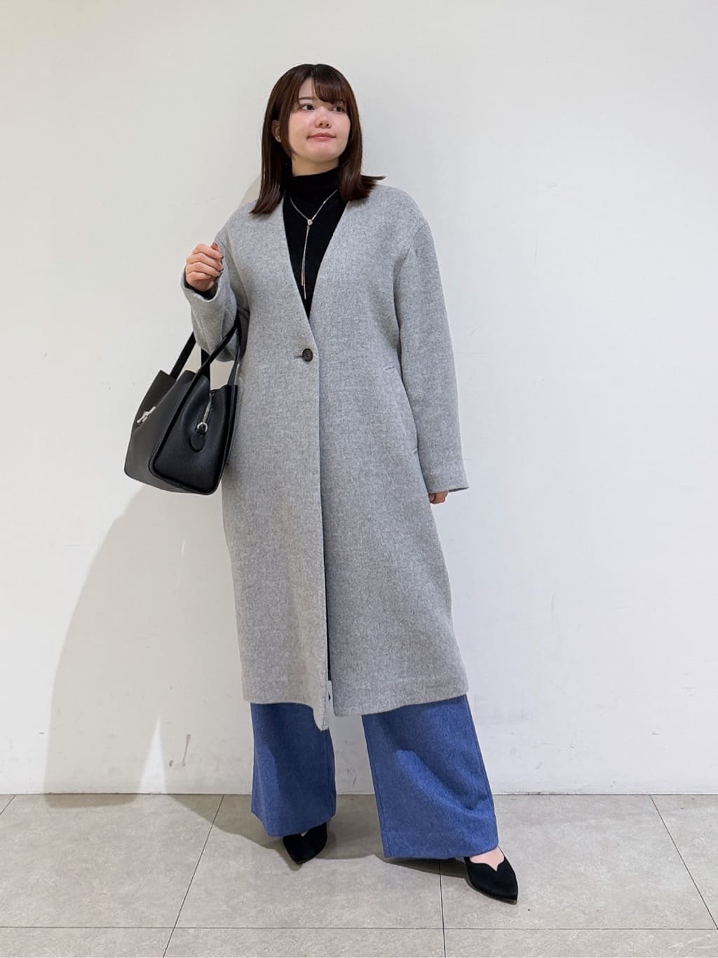 emikaさんの「INDIVI｜【軽量／ウール混】ライトフォルム ロングコート」を使ったコーディネート