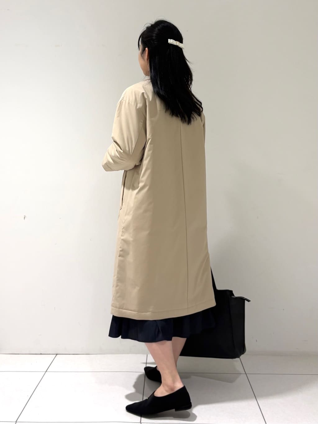 momokoさんの「INDIVI｜【超軽量／蓄熱】ライトパフチェスターコート」を使ったコーディネート