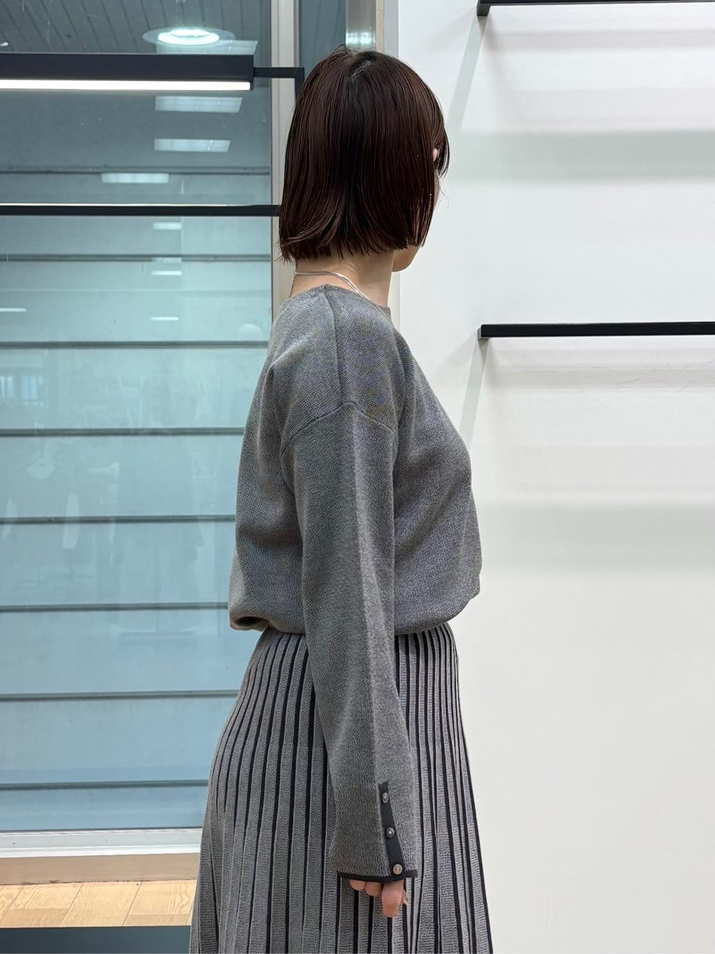 asamiさんの「INDIVI｜【洗える／SETUP可能】ジャカードニット プリーツスカート」を使ったコーディネート