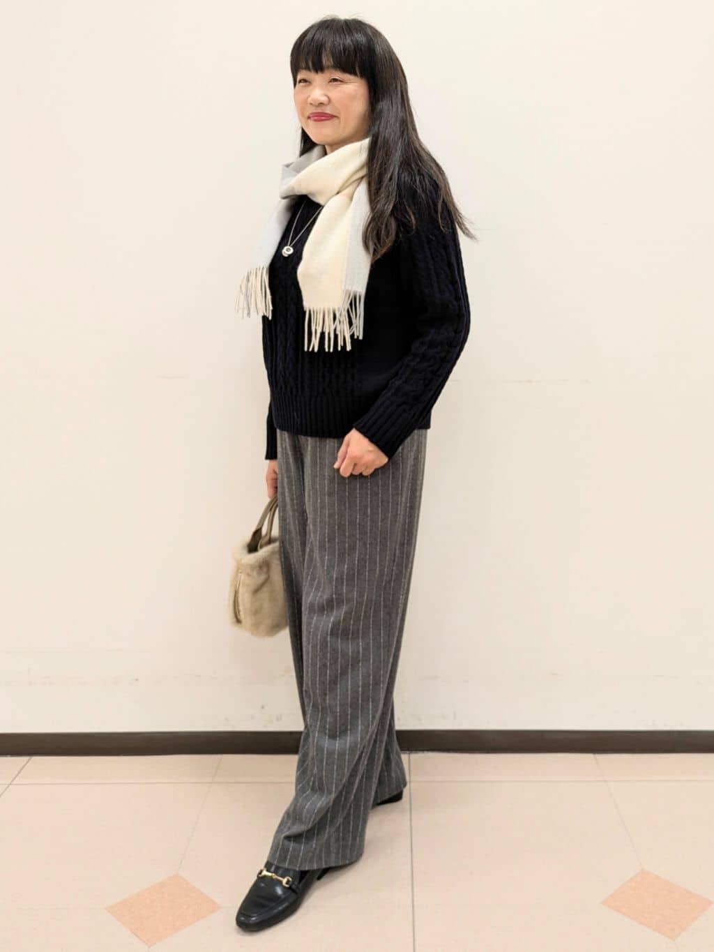 ともさんの「UNTITLED｜【洗える】スポンディッシュ ケーブル柄ニット」を使ったコーディネート