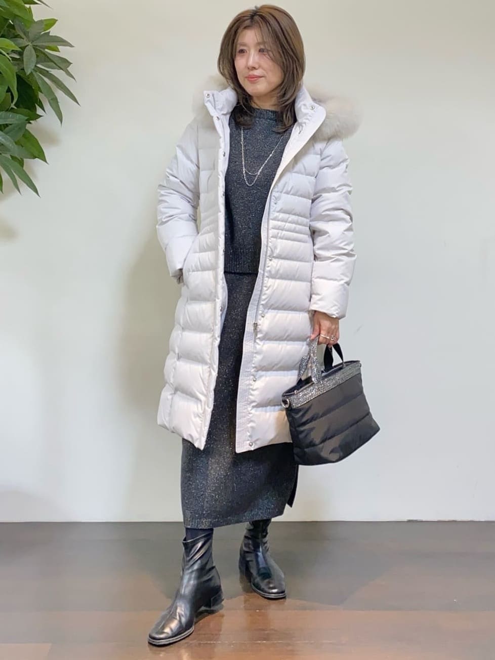 tomoさんの「UNTITLED｜【はっ水機能/フード取り外し可/防寒】ロングダウンコート」を使ったコーディネート