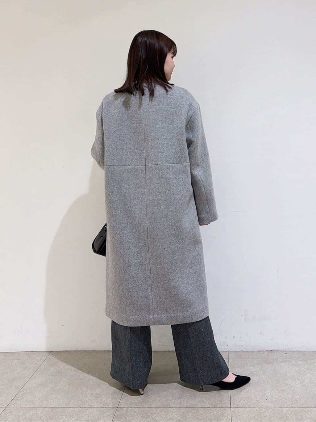 emikaさんの「INDIVI｜【軽量／ウール混】ライトフォルム ロングコート」を使ったコーディネート