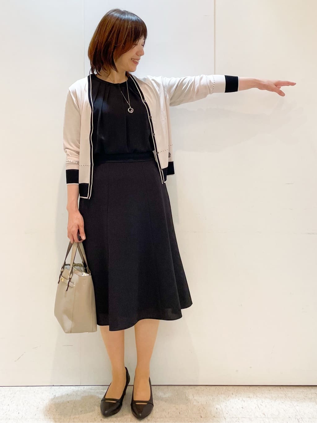 めいさんの「Reflect｜【WEB先行カラーあり／手洗い可／アンサンブル可】バイカラーカーディガン」を使ったコーディネート