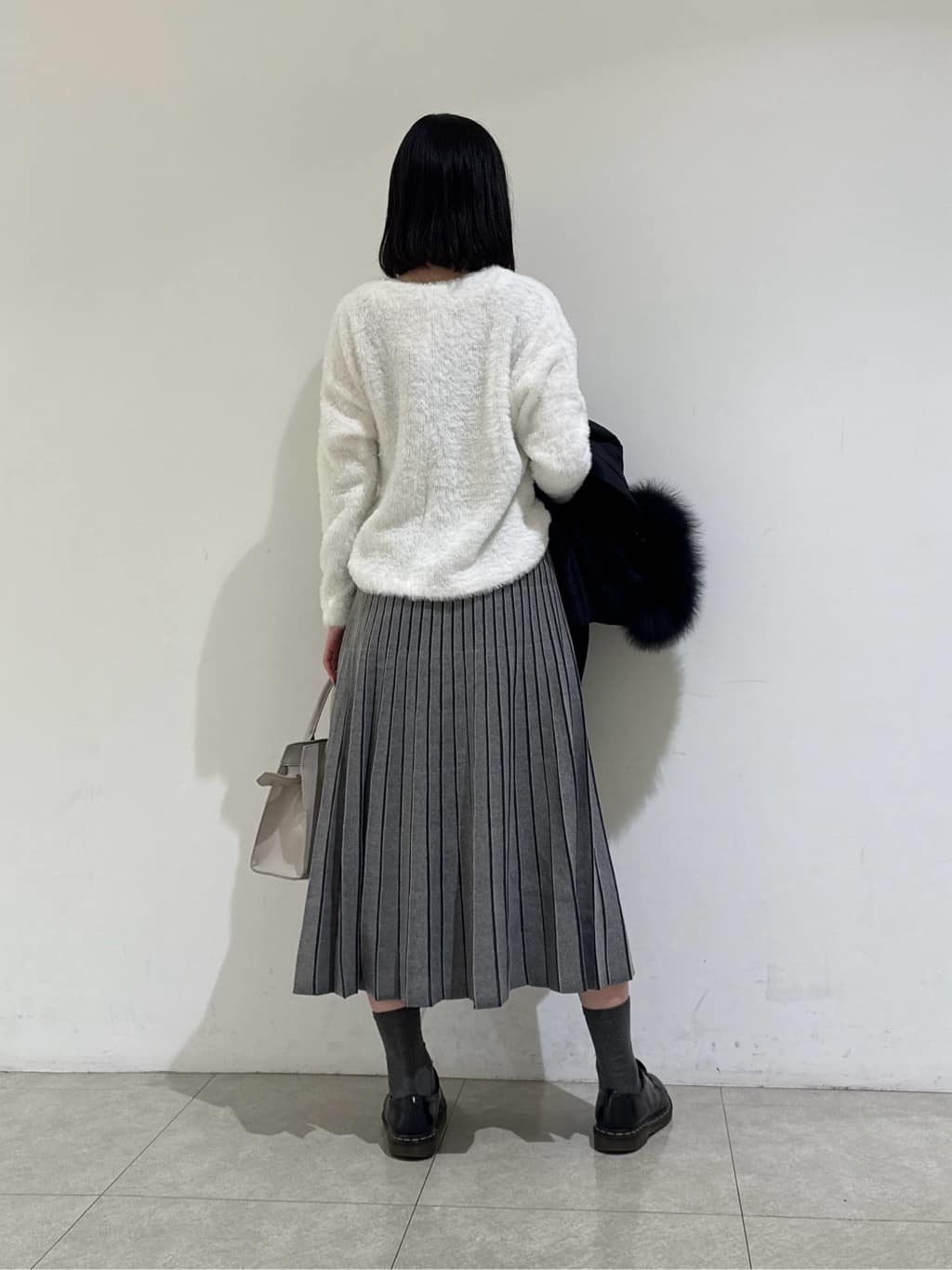 rinaさんの「INDIVI｜【洗える／SETUP可能】ジャカードニット プリーツスカート」を使ったコーディネート