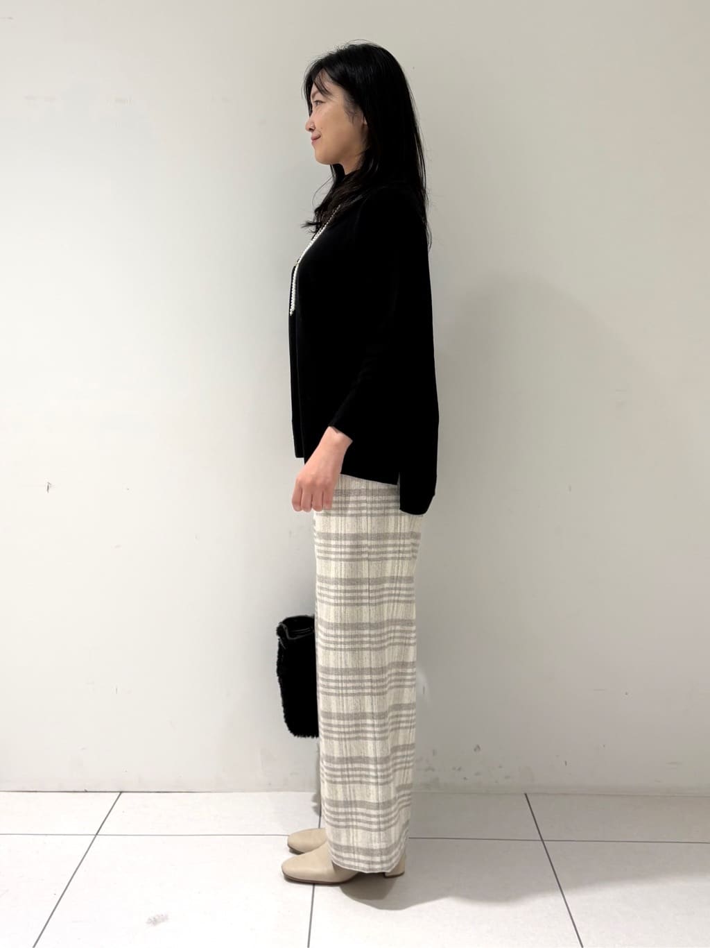 momokoさんの「INDIVI｜【洗える／毛玉になりにくい】エクストラファインウール ハイネックニット」を使ったコーディネート