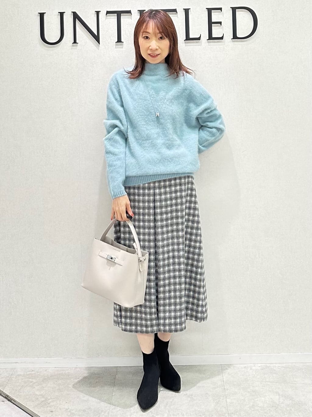 Miwaさんの「UNTITLED｜【ふんわり/タイト見え】シャギーチェックスカート」を使ったコーディネート