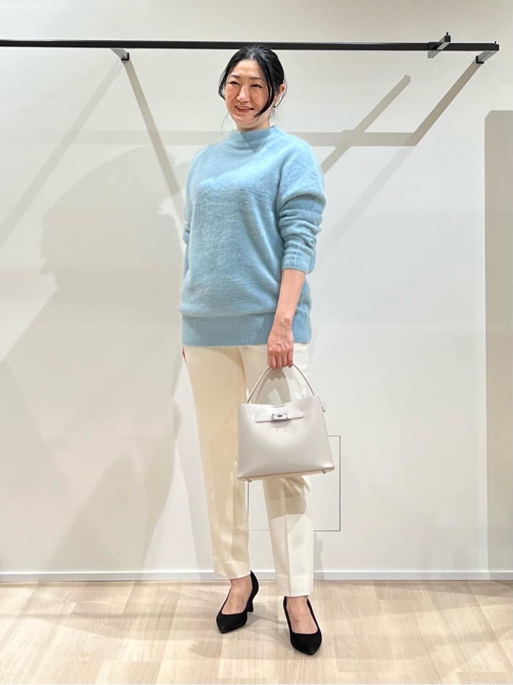 TOMOMIさんの「UNTITLED｜【はっ水機能/フード取り外し可】ミディダウンコート」を使ったコーディネート