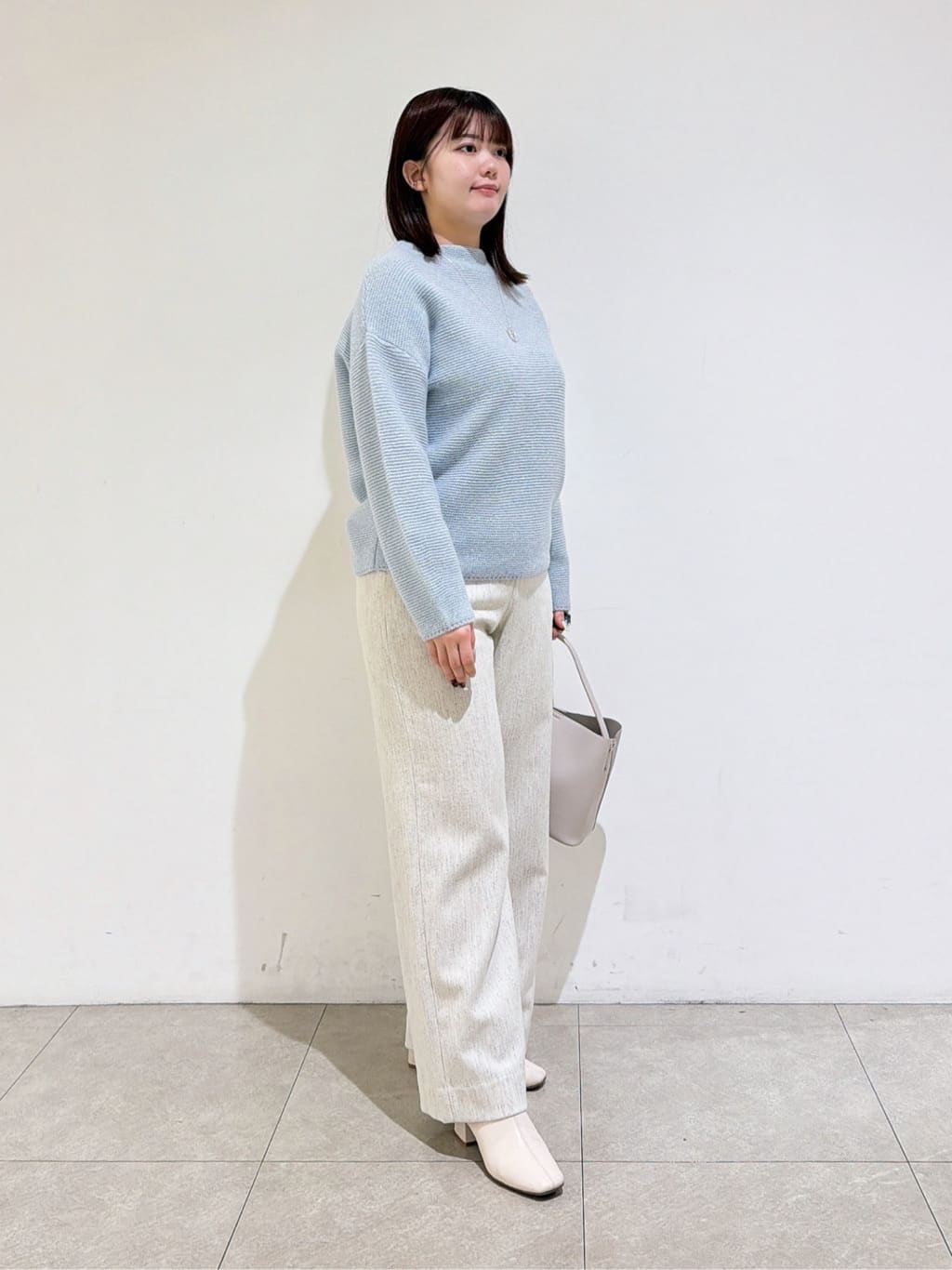 emikaさんの「INDIVI｜【洗える／大人ラメ】カラーMIXボトルネックニット」を使ったコーディネート
