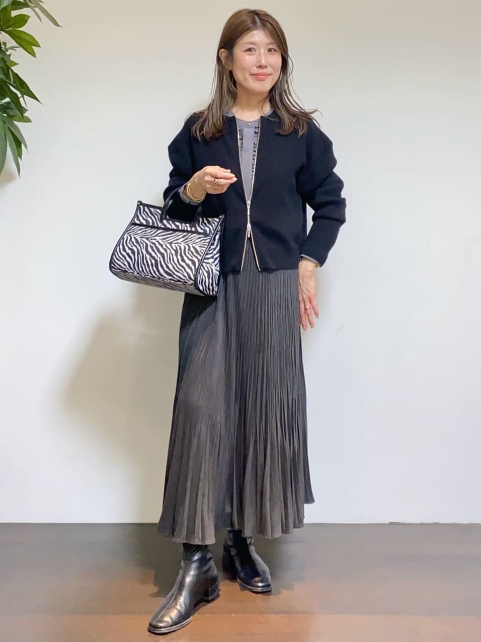 tomoさんの「UNTITLED｜【ゆったりサイズ／着丈短め】ジップニットカーディガン」を使ったコーディネート