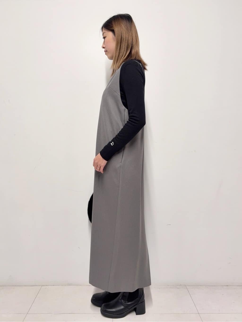 Nishijimaさんの「DRESSTERIOR｜【インナー使いに最適/しっとり暖かな吸湿発熱素材】タートルネックプルオーバー」を使ったコーディネート