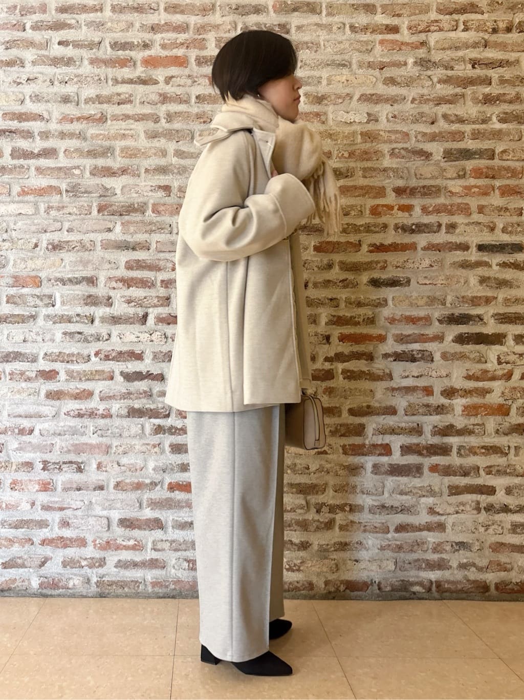 しばさんの「THE SHOP TK｜クラシカルな装い ウールライクスタンドカラーコート」を使ったコーディネート