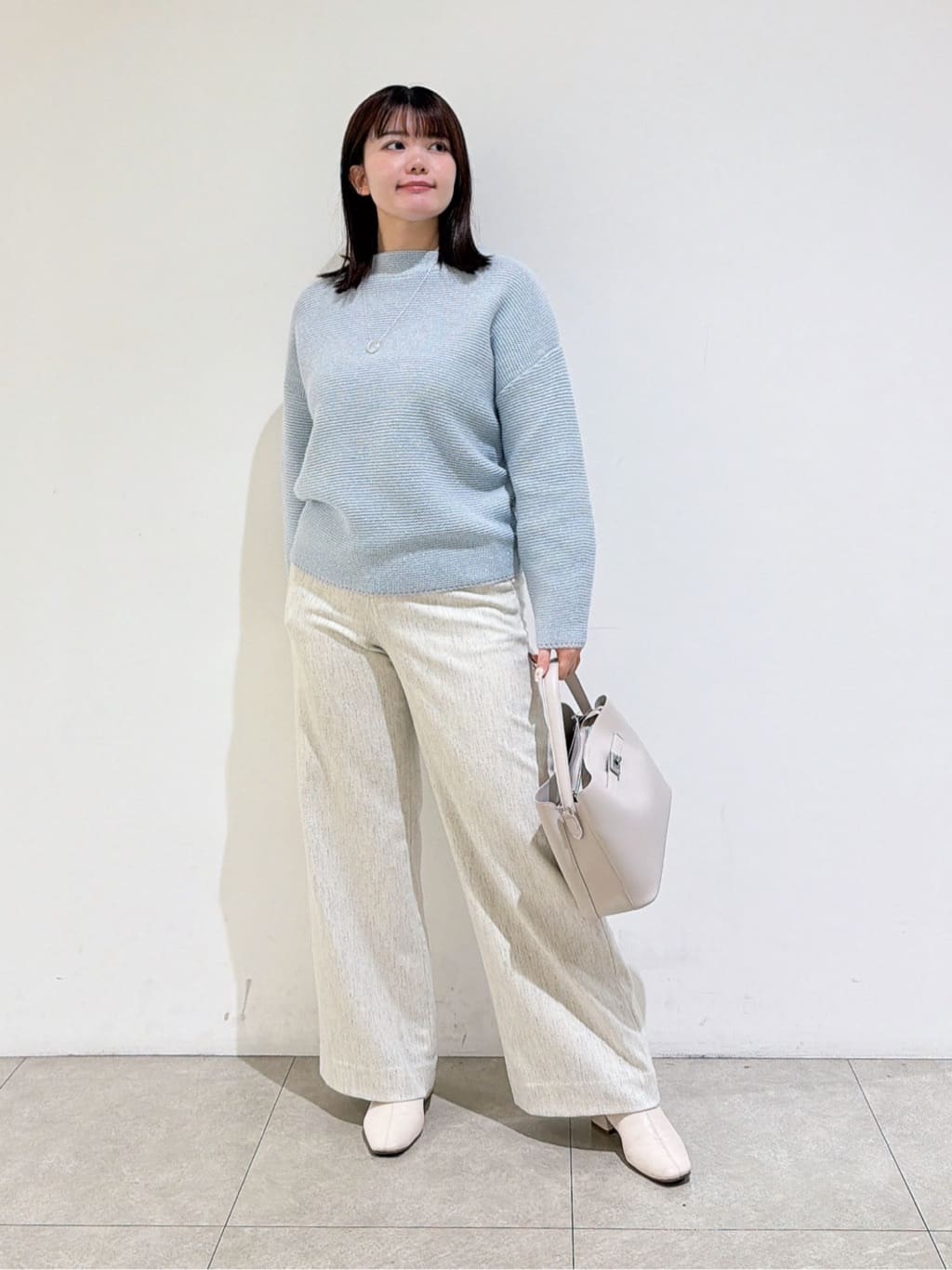 emikaさんの「INDIVI｜【洗える／大人ラメ】カラーMIXボトルネックニット」を使ったコーディネート