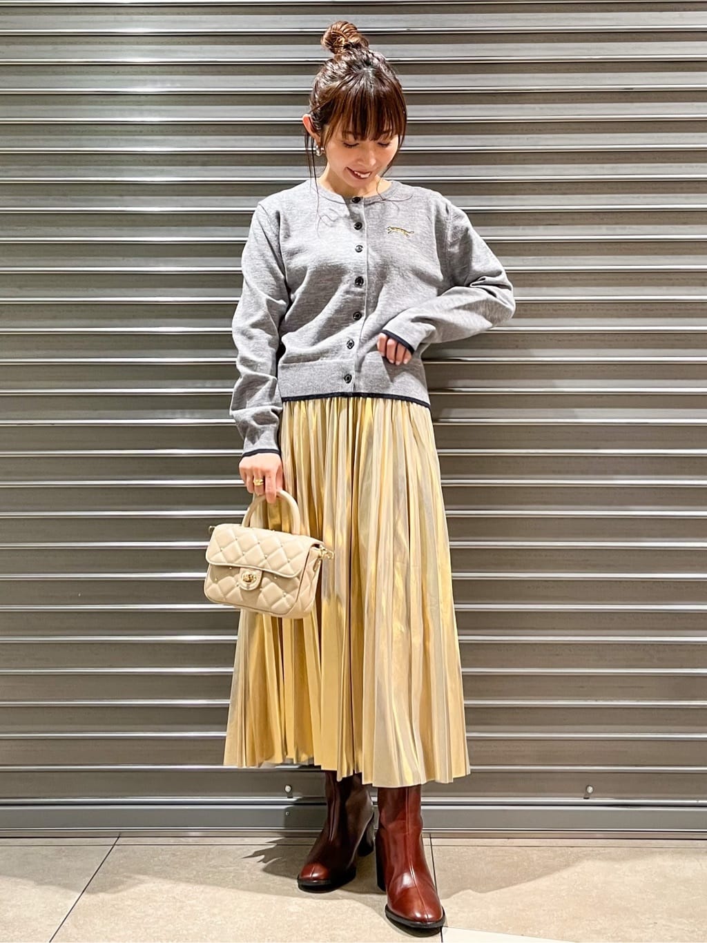 じゅんさんの「DRESSTERIOR｜◆【洗える/ストレッチ性/オンオフ】箔プリントプリーツスカート」を使ったコーディネート