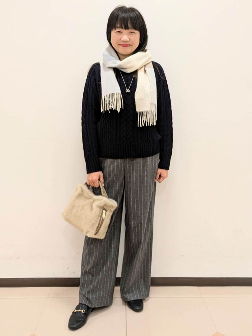 ともさんの「UNTITLED｜【洗える】スポンディッシュ ケーブル柄ニット」を使ったコーディネート